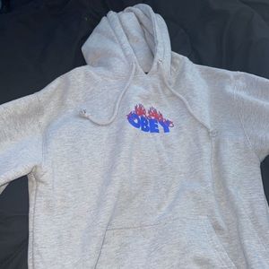 obey worldwide hoodie with fire pattern, only worn once